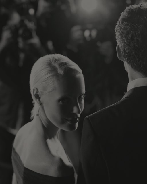 Guests in evening wear at a formal event