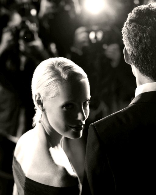 Guests in evening wear at a formal event