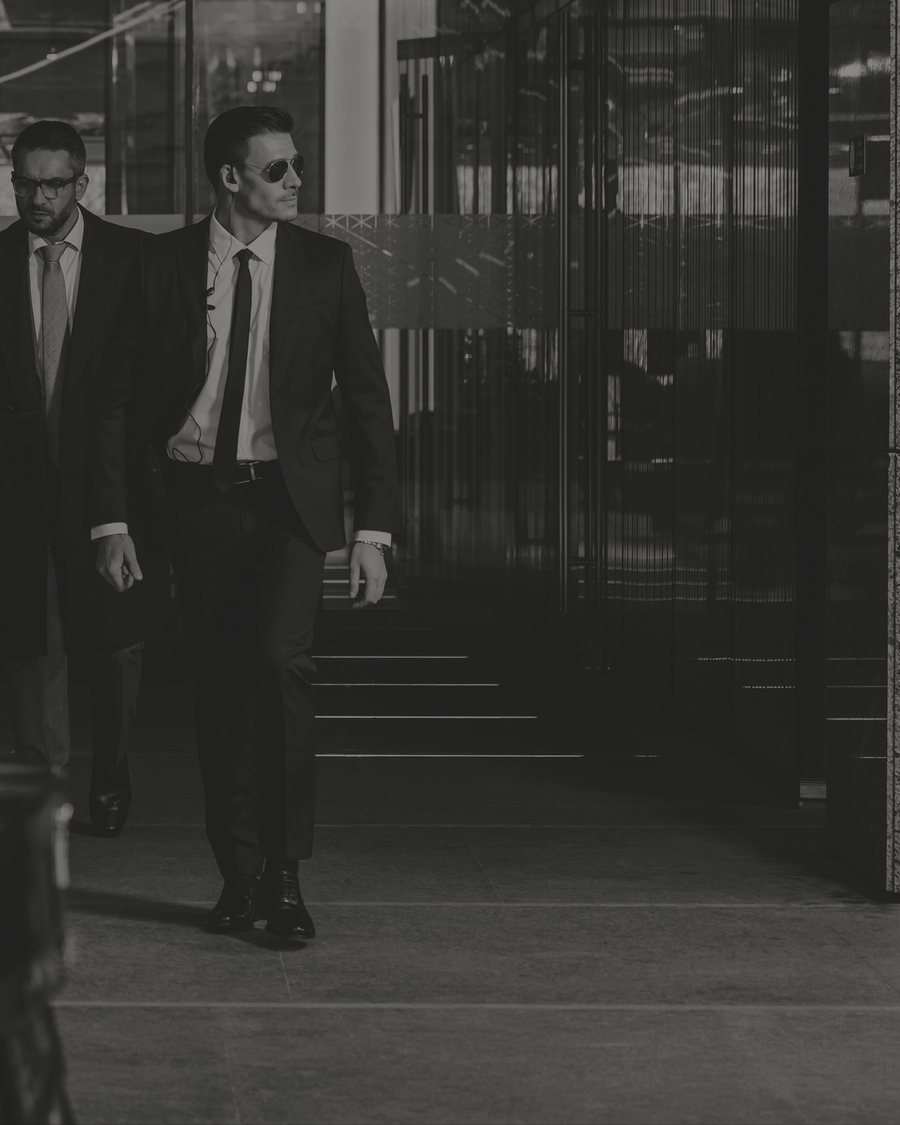 A close protection detail leaving a lobby