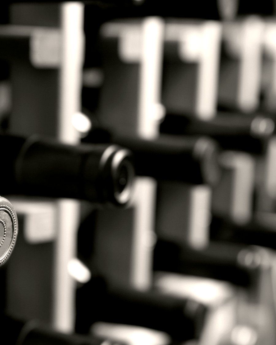 Bottles resting in a cellar rack