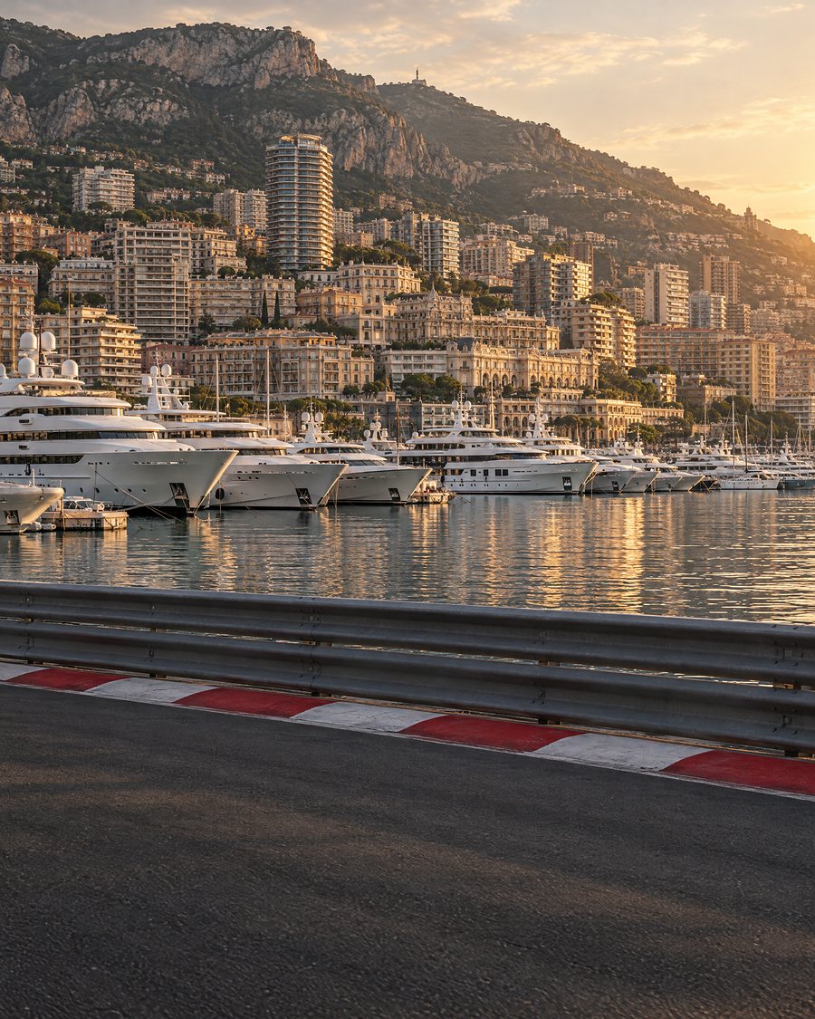 The harbour of Monaco in the morning, a kerb of the street circuit in the foreground (AI illustration)